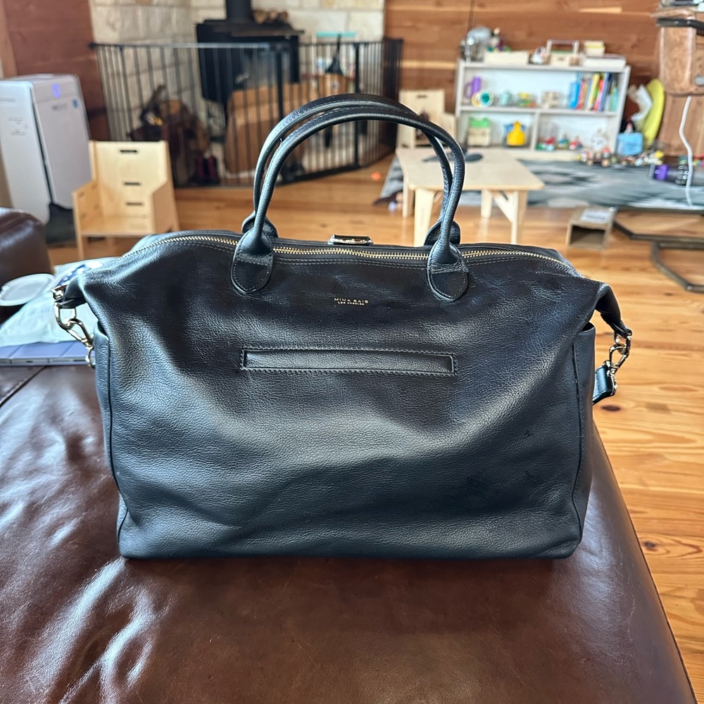 Mina Bae Emmy midi genuine leather. Used only a couple times.